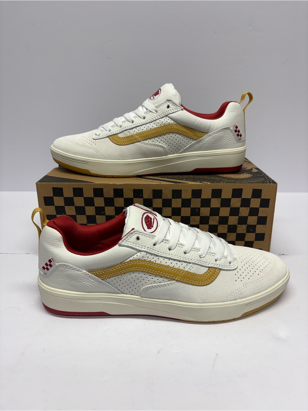Vans White Sneakers with Mustard and Red Accents